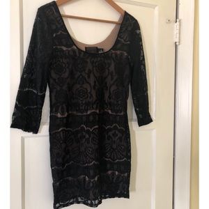 Sexy laced nude and black mini dress